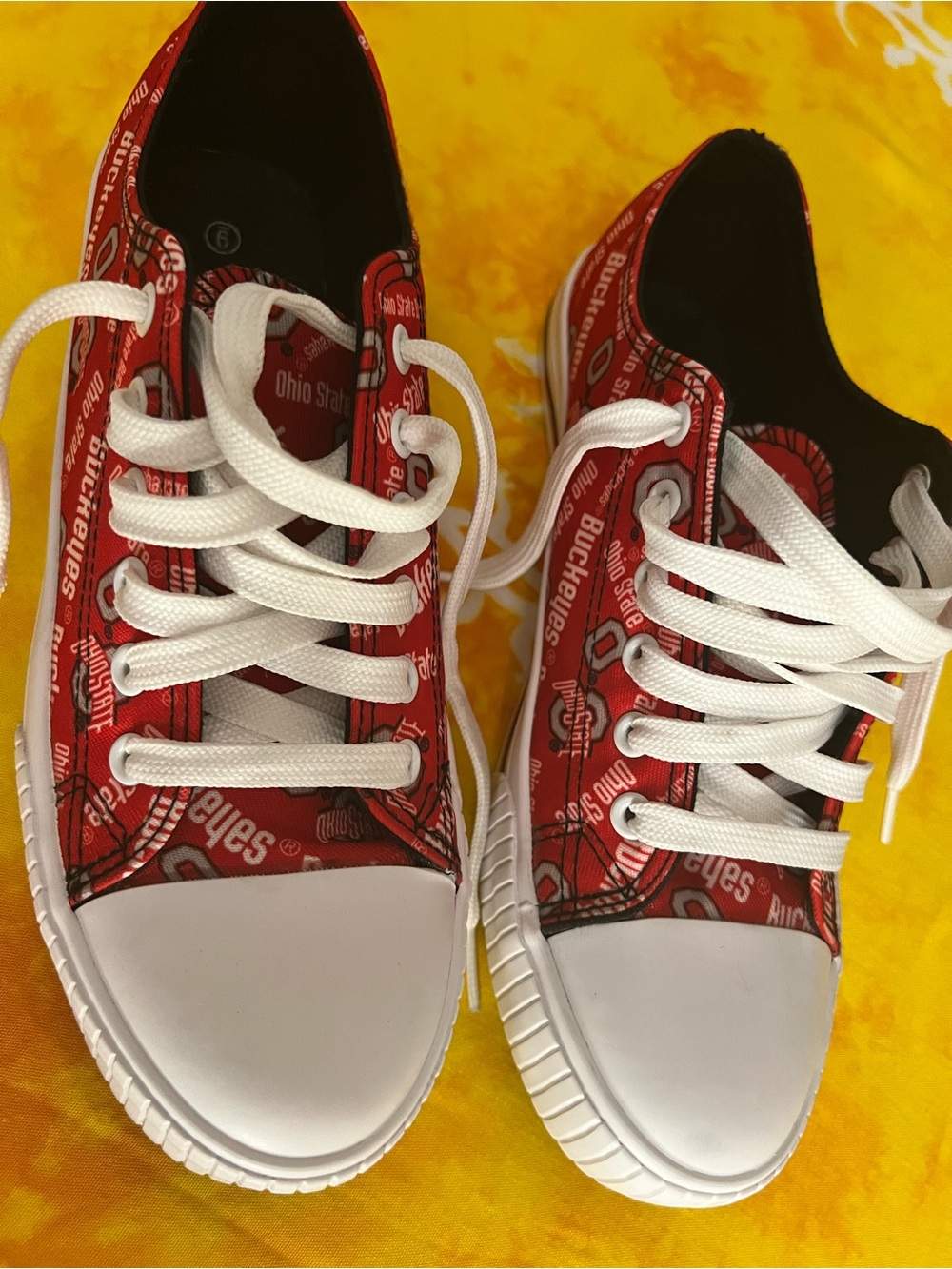 These are the Ohio State Buckeyes low-top canvas sneakers by FOCO